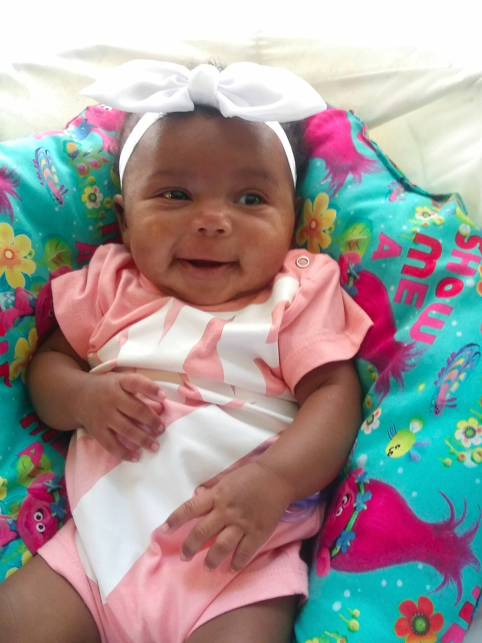 Nova Reign joined the competition — help win amazing prizes! baby, baby_products, cheek, child, linens, nap_mat, person, pink, product, skin, smile, textile, toddler