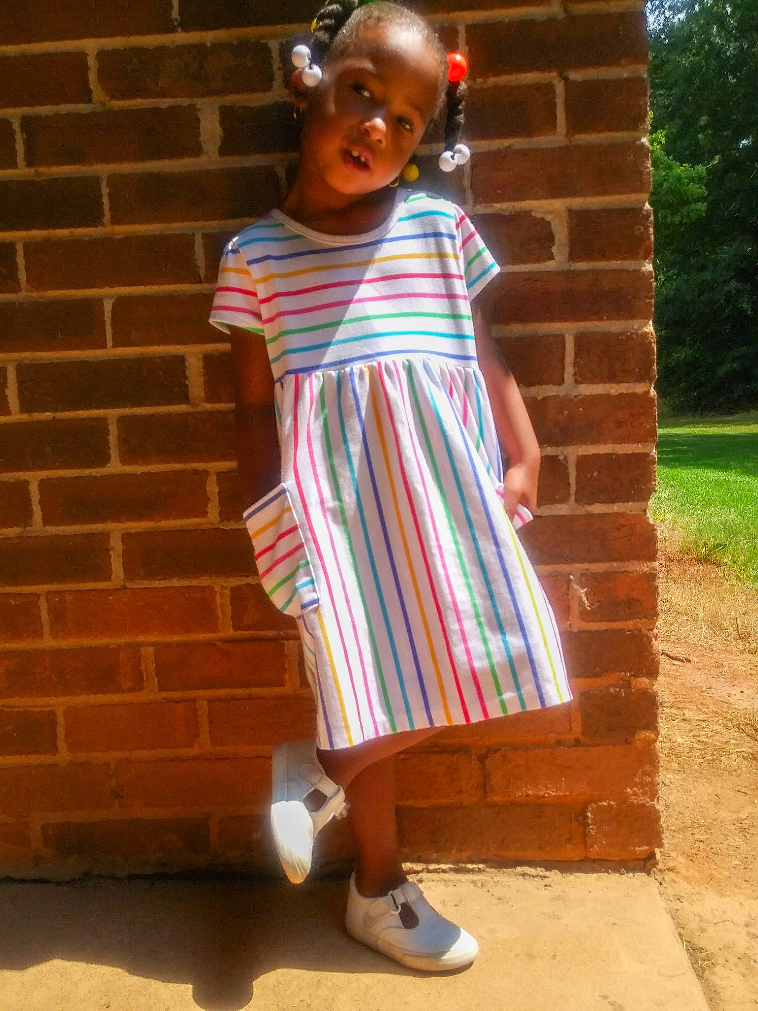 Amariana is registered to the contest to win money with this photo: child, dress, person, shoe, standing, textile, toddler