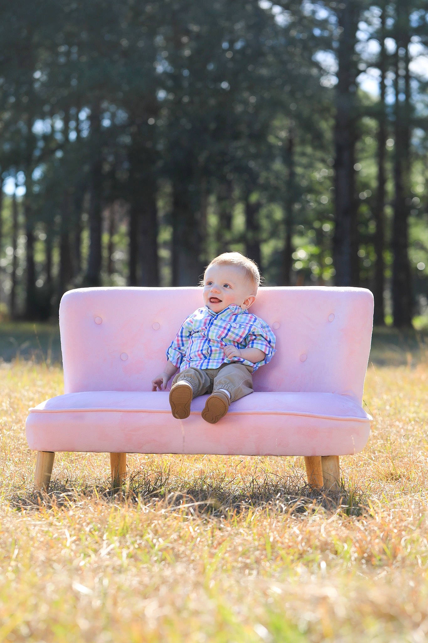Brett is registered to the contest to win money with this photo: baby, chair, child, furniture, grass, leisure, people, person, photograph, photography, pink, plant, portrait_photography, recreation, sitting, spring, summer, toddler, tree, vacation