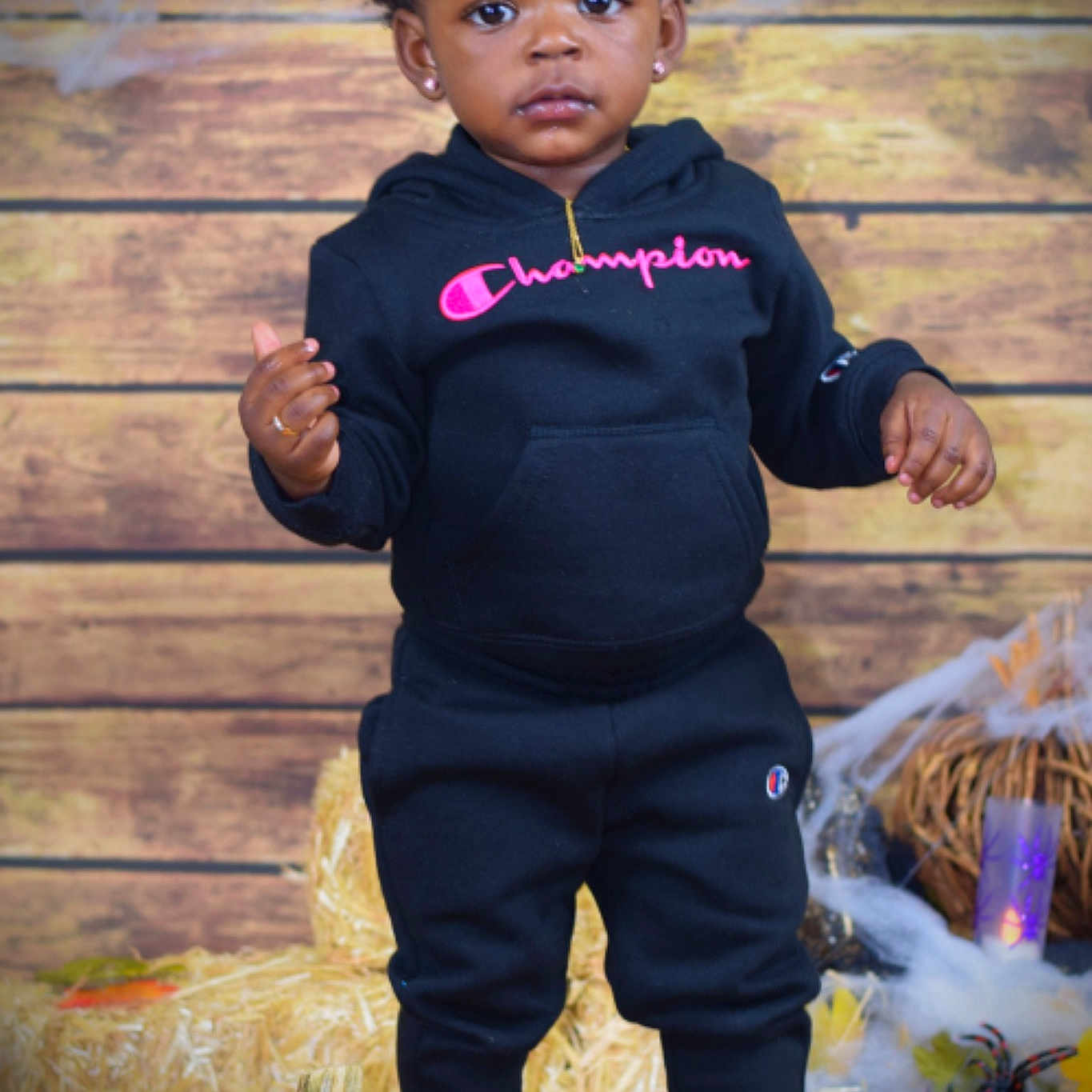 Queen is registered to the contest to win money with this photo: boy, child, fun, girl, halloween, infant, person, play, recreation, smile, standing, toddler