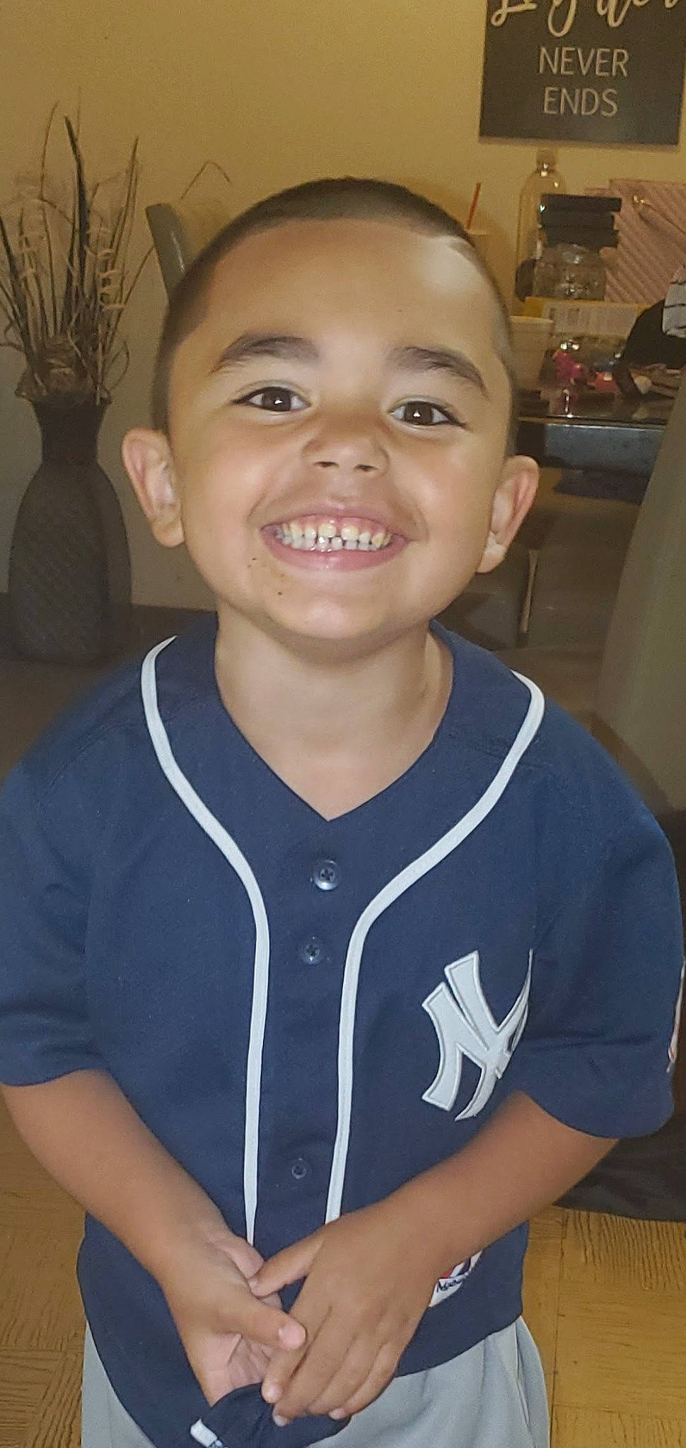 Jaymeson is registered to the contest to win money with this photo: blue, cheek, clothing, eye, face, finger, fun, hair, hairstyle, head, human, joy, lip, natural_environment, people, person, product, room, skin, smile