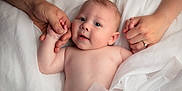Jackson is registered to the contest to win money with this photo: baby, bed, blanket, child, closeup, cute, expression, family, hands, holding, infant, love, newborn, parent, portrait, resting, skin, soft_light, tenderness, white_fabric