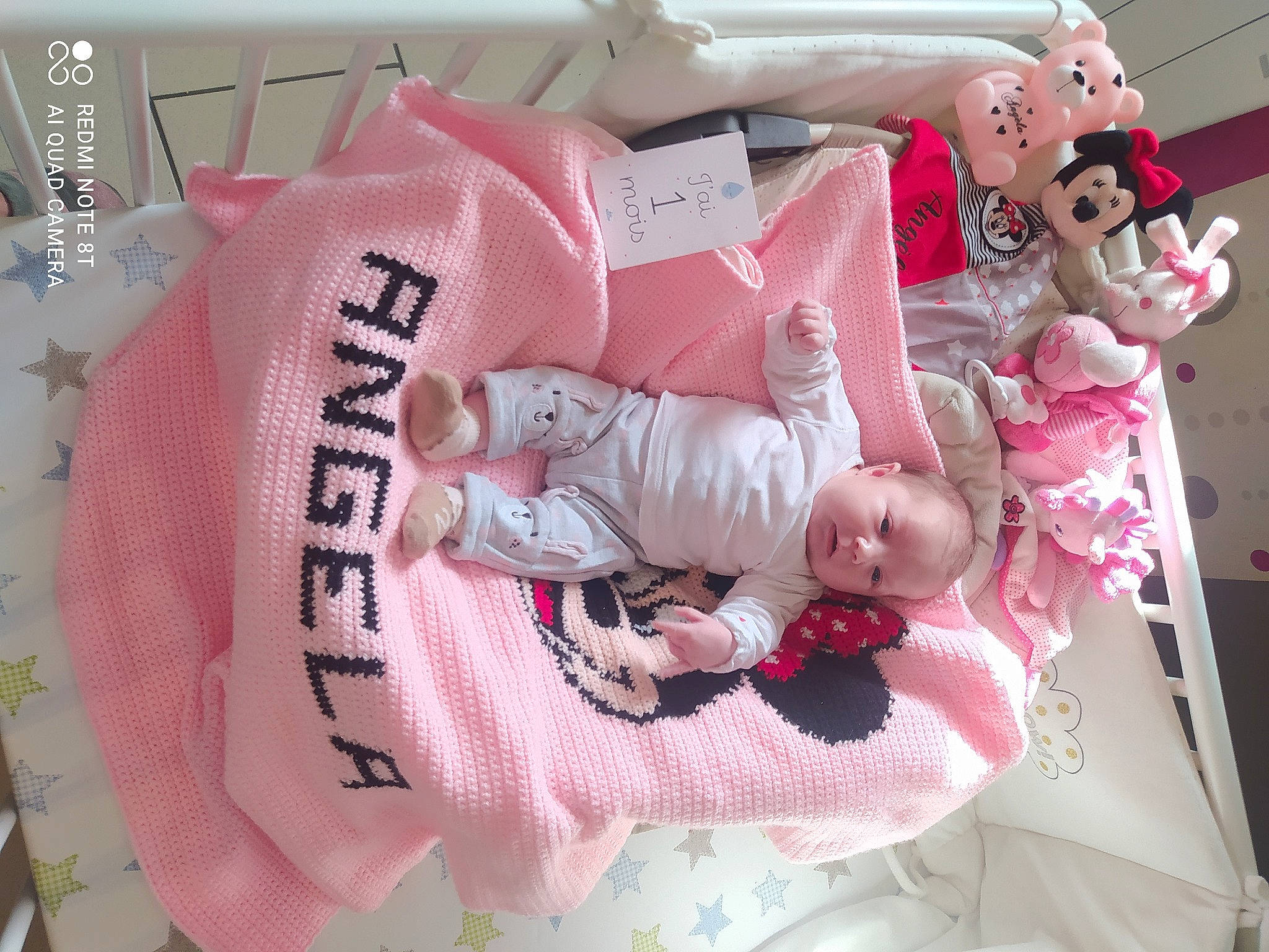 Angèla participe au concours pour gagner de l'argent avec cette photo : baby, baby_products, baby_safety, baby_toddler_clothing, child, comfort, creative_arts, event, font, happy, linens, magenta, pattern, peach, person, pink, room, sleeve, textile, toddler