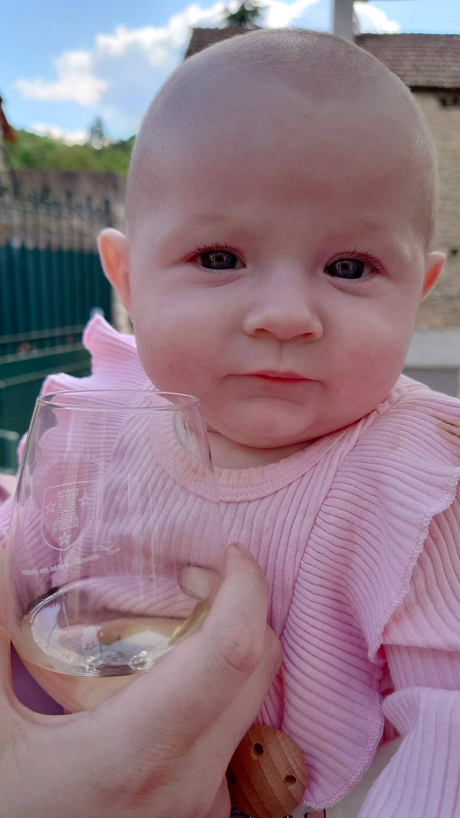 Maddy participe au concours pour gagner de l'argent avec cette photo : baby, baby_toddler_clothing, cheek, chin, cloud, drinkware, facial_expression, finger, gesture, hand, happy, iris, lip, mouth, nose, person, pink, product, skin, sleeve