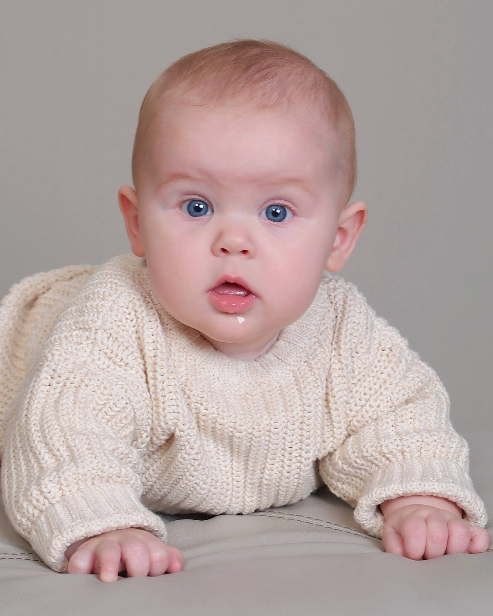 Sailor joined the competition — help win amazing prizes! arm, baby, baby_toddler_clothing, cheek, child, collar, comfort, eye, face, flooring, grey, iris, lip, pattern, person, portrait_photography, sitting, skin, sleeve, surprise