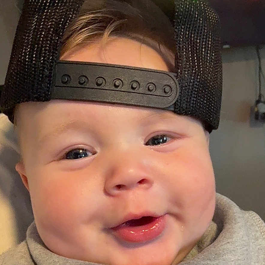 Hudson joined the competition — help win amazing prizes! accessories, baby, balloon, baseballcap, beanie, bodypart, cap, clothing, face, finger, hand, happy, hat, head, lighting, person, photography, portrait, smile, sphere