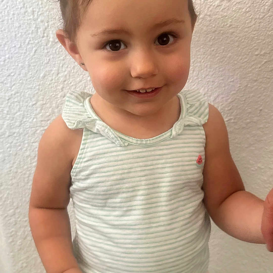 Miracle joined the competition — help win amazing prizes! baby, bodypart, brownhair, clothing, dress, face, finger, hair, happy, head, mouth, person, photography, portrait, shoulder, sleeve, smile, standing, tanktop, teeth