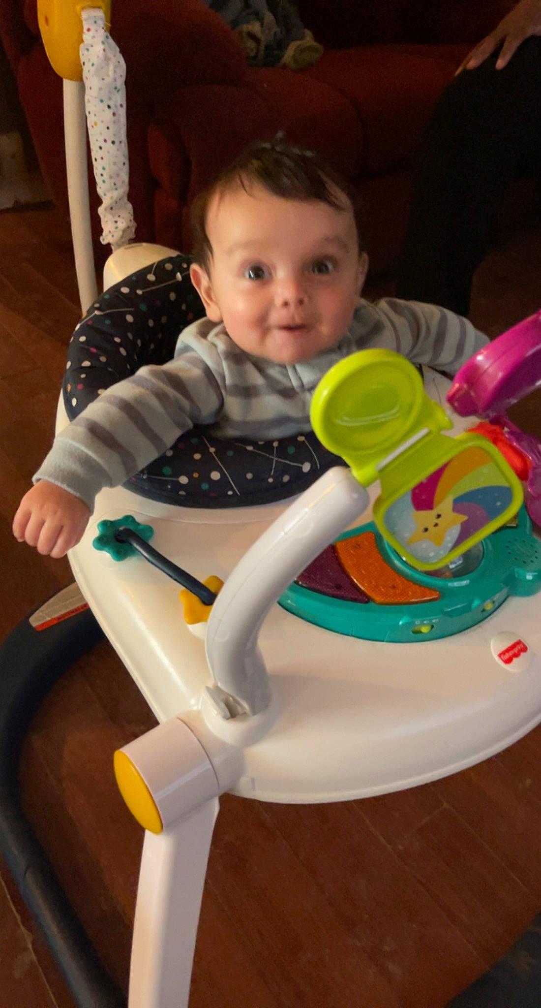 Brodie joined the competition — help win amazing prizes! baby, baby_playing_with_toys, baby_products, baby_toddler_clothing, chair, child, comfort, fun, happy, human_leg, leisure, person, plastic, play, recreation, sitting, smile, sock, thigh, toddler