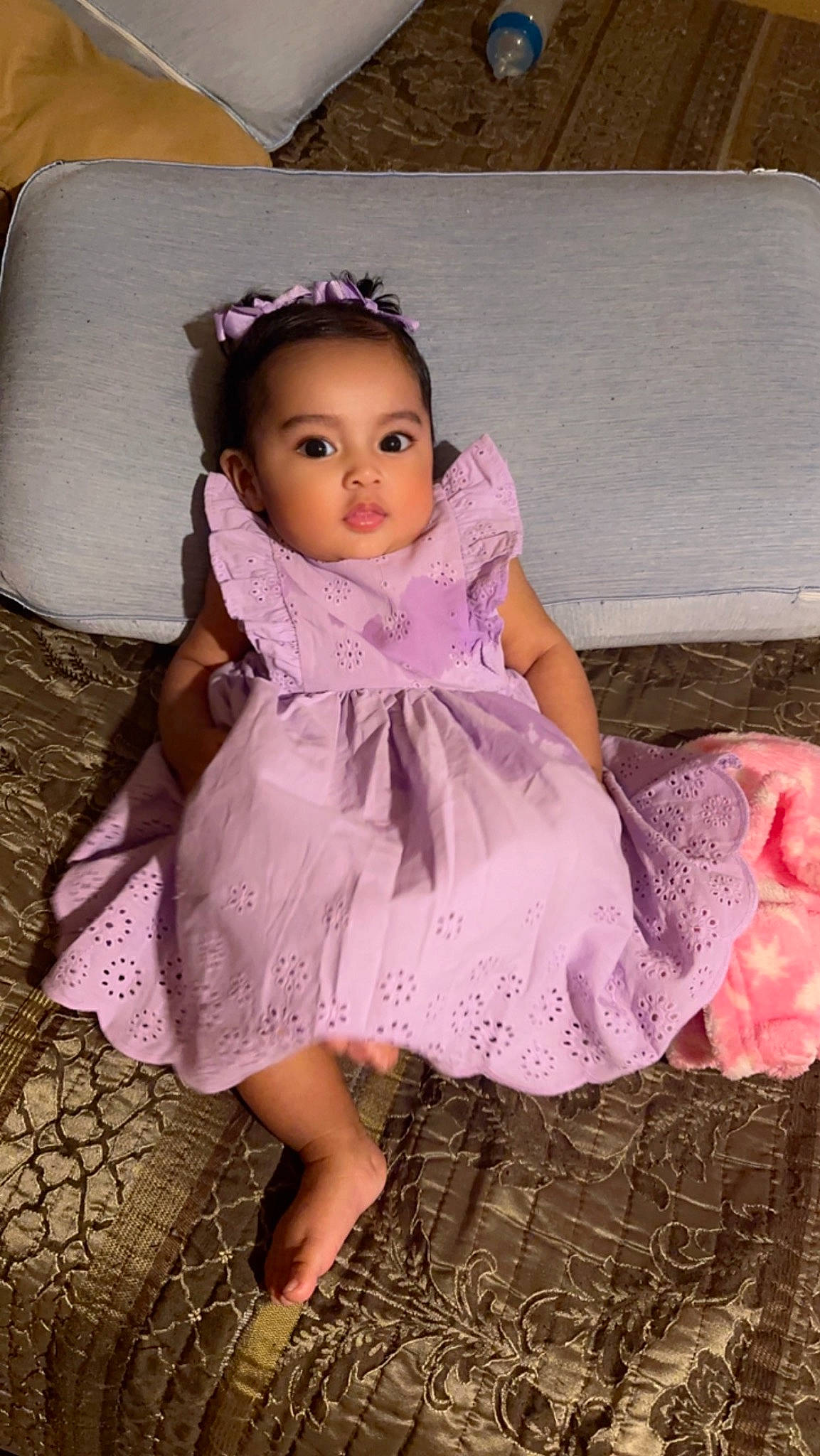 Andrea is registered to the contest to win money with this photo: baby_toddler_clothing, bridal_accessory, cheek, day_dress, dress, embellishment, eye, fashion_design, fun, hair, headgear, headpiece, iris, lip, magenta, one_piece_garment, person, pink, purple, skin