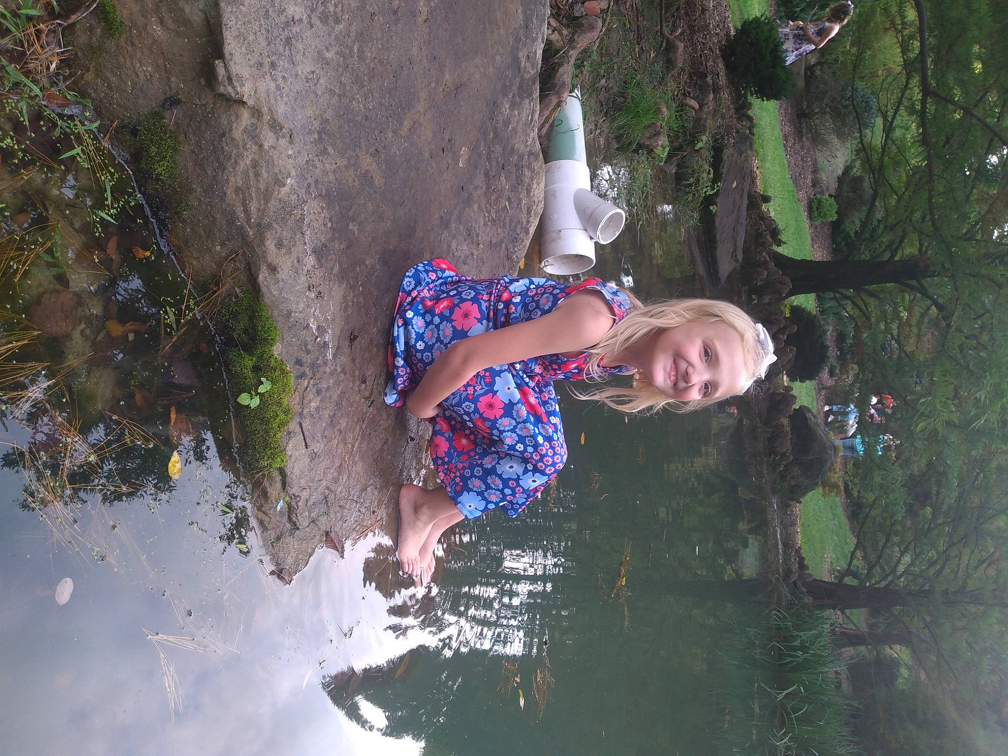 Rayelynn is registered to the contest to win money with this photo: adventure, body_of_water, electric_blue, fun, grass, happy, joy, leisure, people_in_nature, person, plant, recreation, reflection, tree, vacation, water