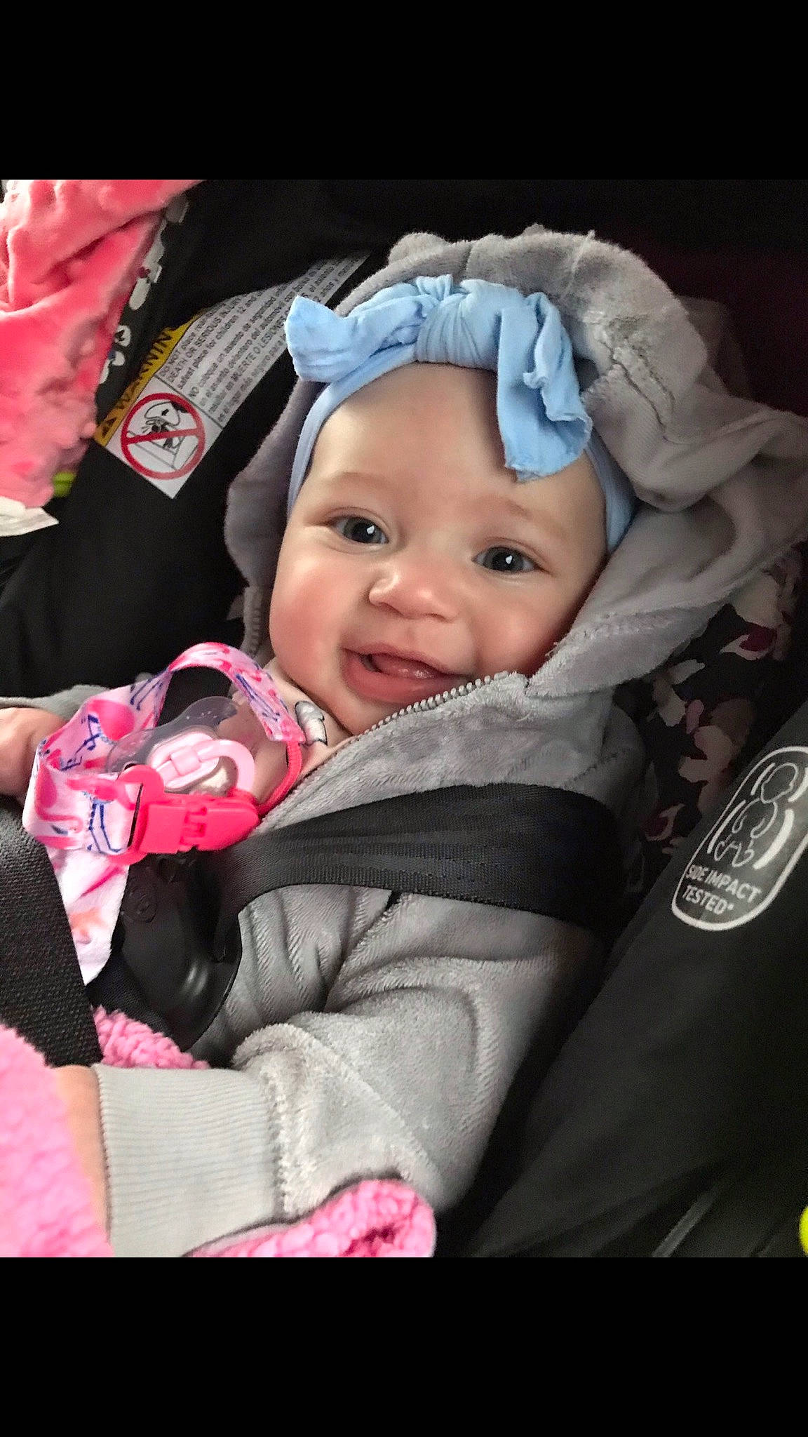 Tylynn joined the competition — help win amazing prizes! baby, baby_carriage, baby_in_car_seat, baby_products, baby_safety, baby_toddler_clothing, car_seat, cheek, child, comfort, event, facial_expression, happy, headwear, magenta, mouth, outerwear, person, pink, skin