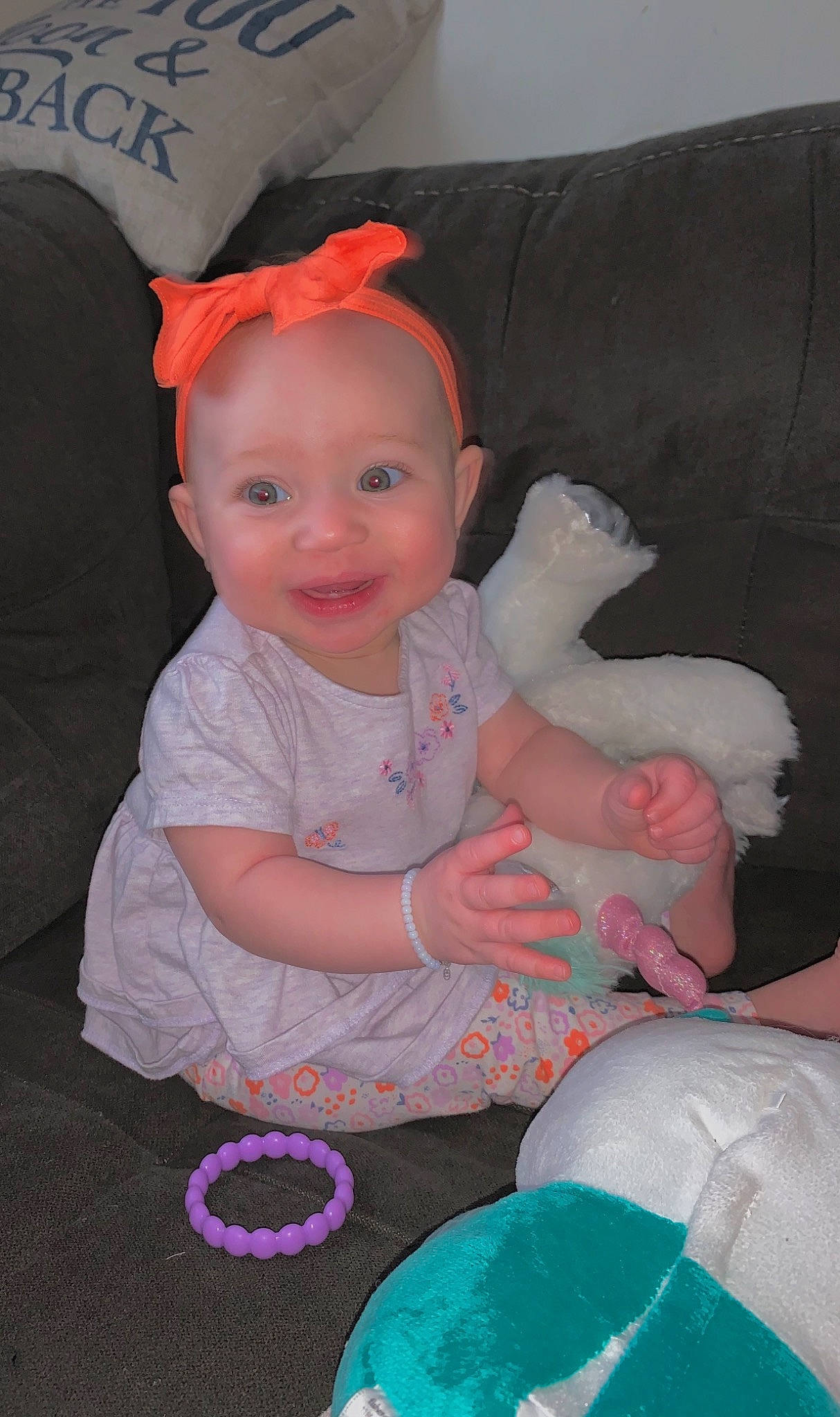 Tylynn is registered to the contest to win money with this photo: baby, baby_toddler_clothing, cheek, child, event, eye, fun, happy, head, headgear, human_body, lap, magenta, person, pink, skin, sleeve, smile, t_shirt, toddler