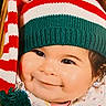baby, cheeks, child, closeup, clothing, cute, face, festive, green, happy, hat, holiday, infant, knit_hat, pom_pom, portrait, red, smiling, warm, white