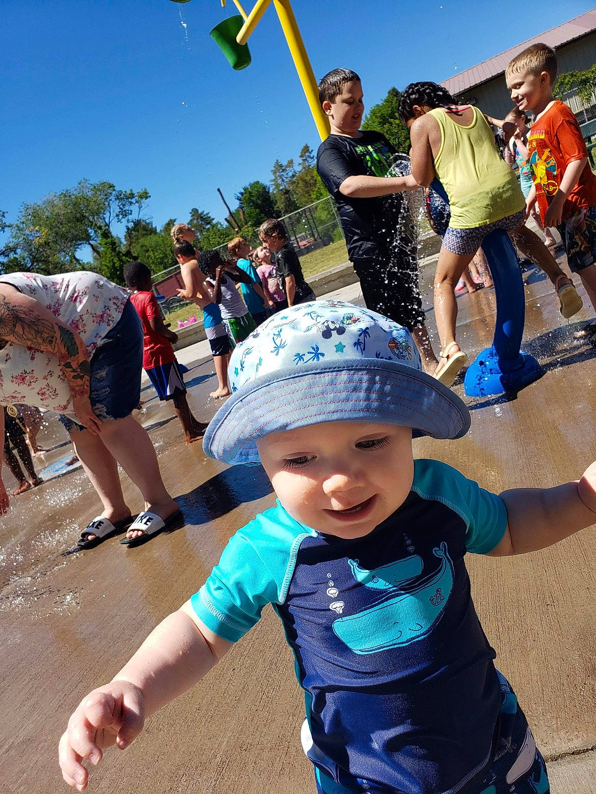 Roman joined the competition — help win amazing prizes! baby_toddler_clothing, blue, cap, crowd, fashion, fun, green, happy, hat, headwear, human, joy, leisure, person, pink, public_space, recreation, shorts, sky, style