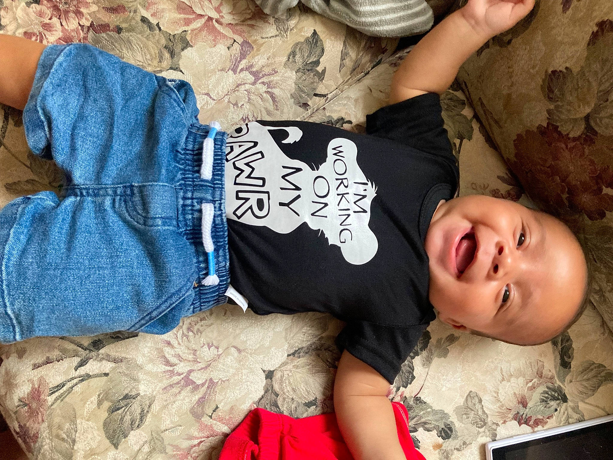 Jason is registered to the contest to win money with this photo: arm, child, cool, facial_expression, flash_photography, fun, hairstyle, hand, happy, human_body, interaction, leg, person, plant, skin, sleeve, smile, textile, thigh, tree