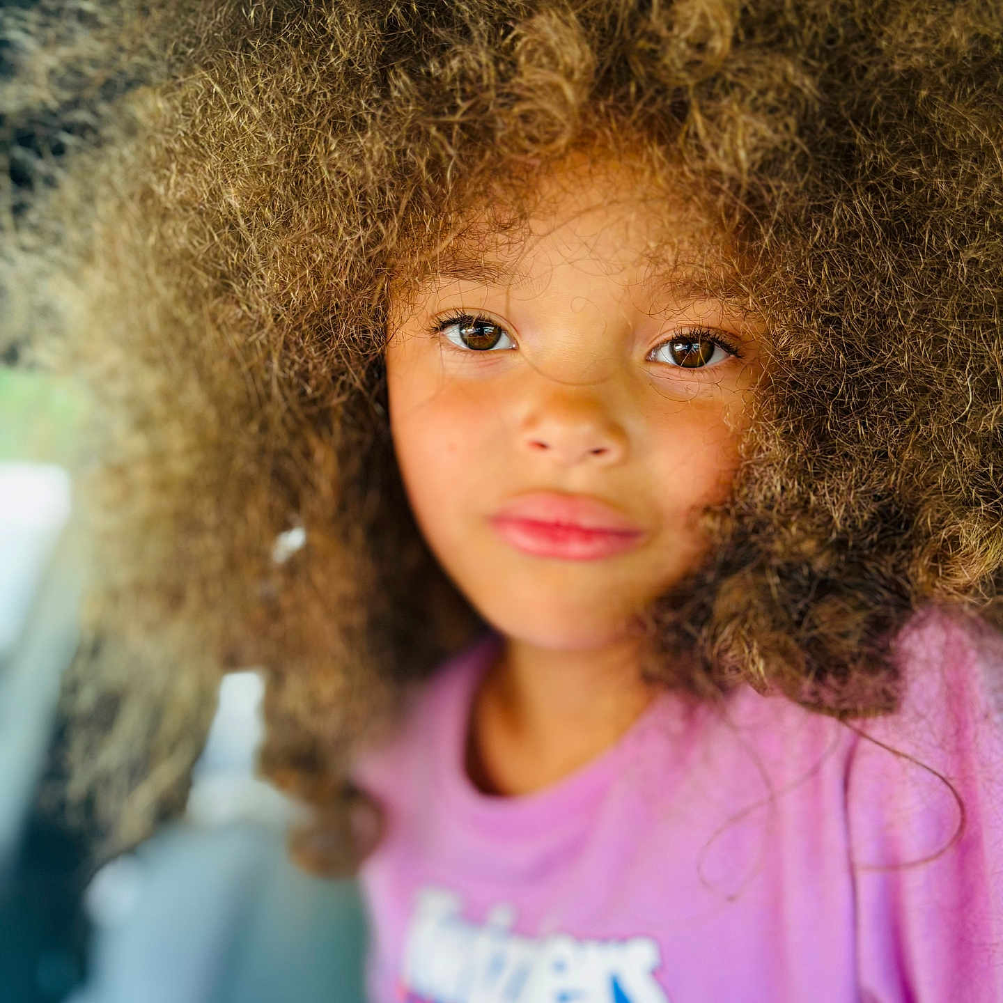 Mia Collins is registered to the contest to win money with this photo: blonde, bodypart, child, clothing, cosmetics, face, female, finger, frown, girl, hair, hand, happy, head, lipstick, person, photography, portrait, smile, t_shirt