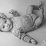 Olivia participe au concours pour gagner de l'argent avec cette photo : baby, infant, lace_clothing, headband, flower, portrait, black_and_white, newborn, cute, lying_down, soft_texture, close_up, child, face, hands, feet, studio, photography, monochrome, expression