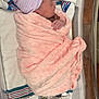 Bethany is registered to the contest to win money with this photo: architecture, baby, bed, blanket, building, childbirth, clothing, cradle, crib, face, furniture, hat, head, hospital, infantbed, newborn, person, sleeping