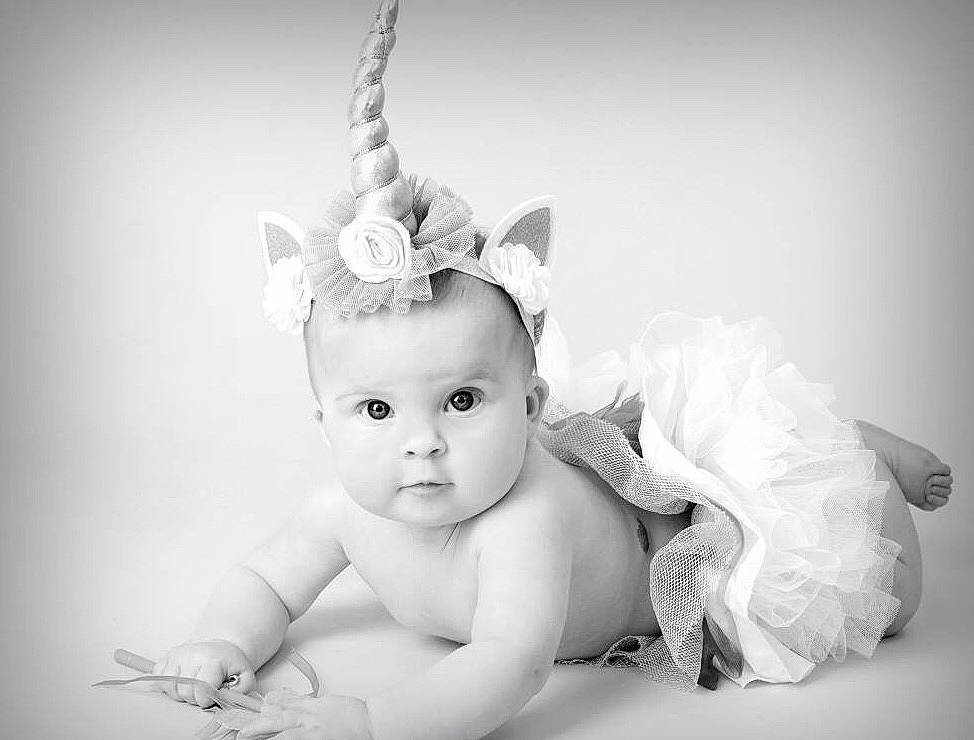 Blossom is registered to the contest to win money with this photo: beauty, black_and_white, child, ear, girl, hair_accessory, headpiece, infant, monochrome, monochrome_photography, person, photo_shoot, photograph, photography, portrait_photography, skin, smile, stock_photography, toddler, white