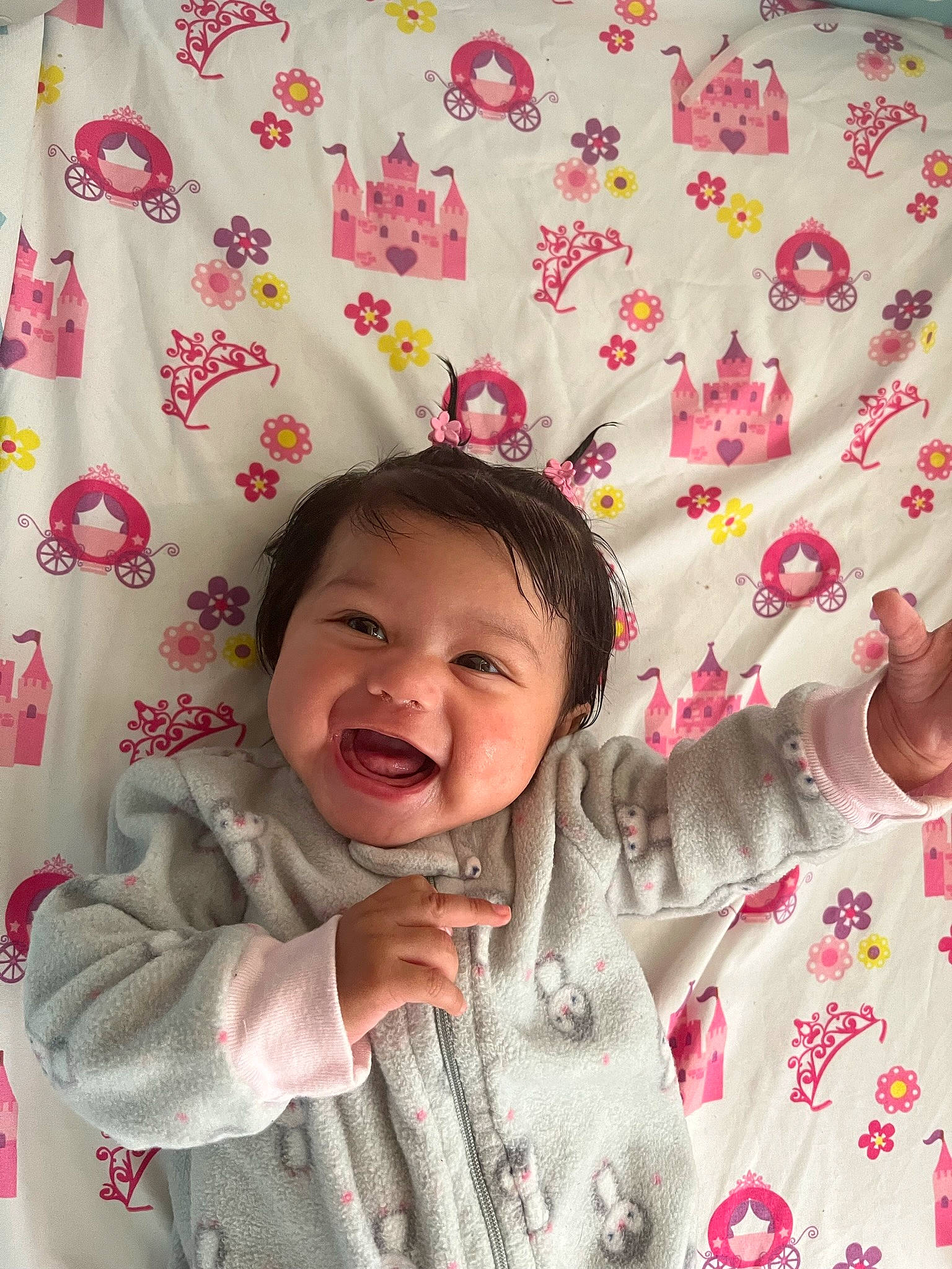 Mis is registered to the contest to win money with this photo: baby, baby_toddler_clothing, beauty, child, design, facial_expression, gesture, happy, linens, magenta, pattern, person, photograph, pink, product, skin, sleeve, smile, textile, toddler