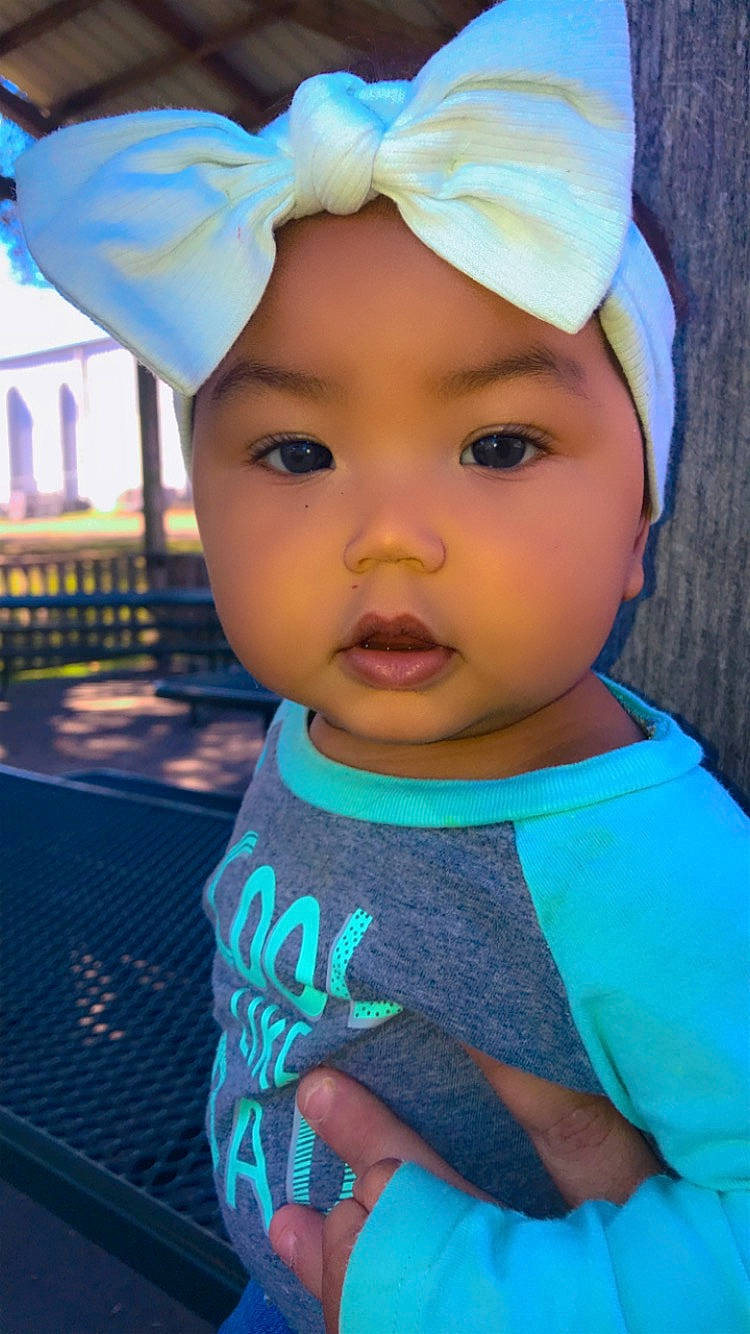 Ambreah is registered to the contest to win money with this photo: aqua, azure, baby_toddler_clothing, blue, cap, cheek, cool, eyebrow, eyelash, happy, hat, headgear, headwear, iris, lip, person, photograph, pink, skin, sun_hat