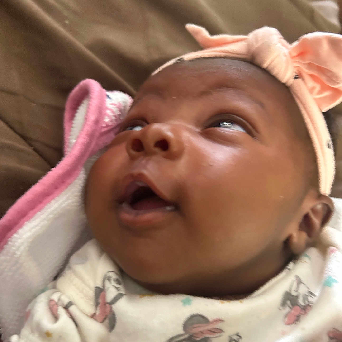 Kybria joined the competition — help win amazing prizes! baby, blanket, bow, child, closeup, clothing, cozy, cute, expression, face, head, headband, indoors, infant, looking_up, newborn, patterned_outfit, person, skin, soft