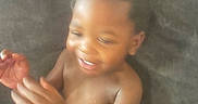 Zarie is registered to the contest to win money with this photo: baby, blurred, casual, child, clapping, couch, diaper, face, furniture, hair, hands, happy, home, indoor, person, seated, skin, smiling, toddler, young_child