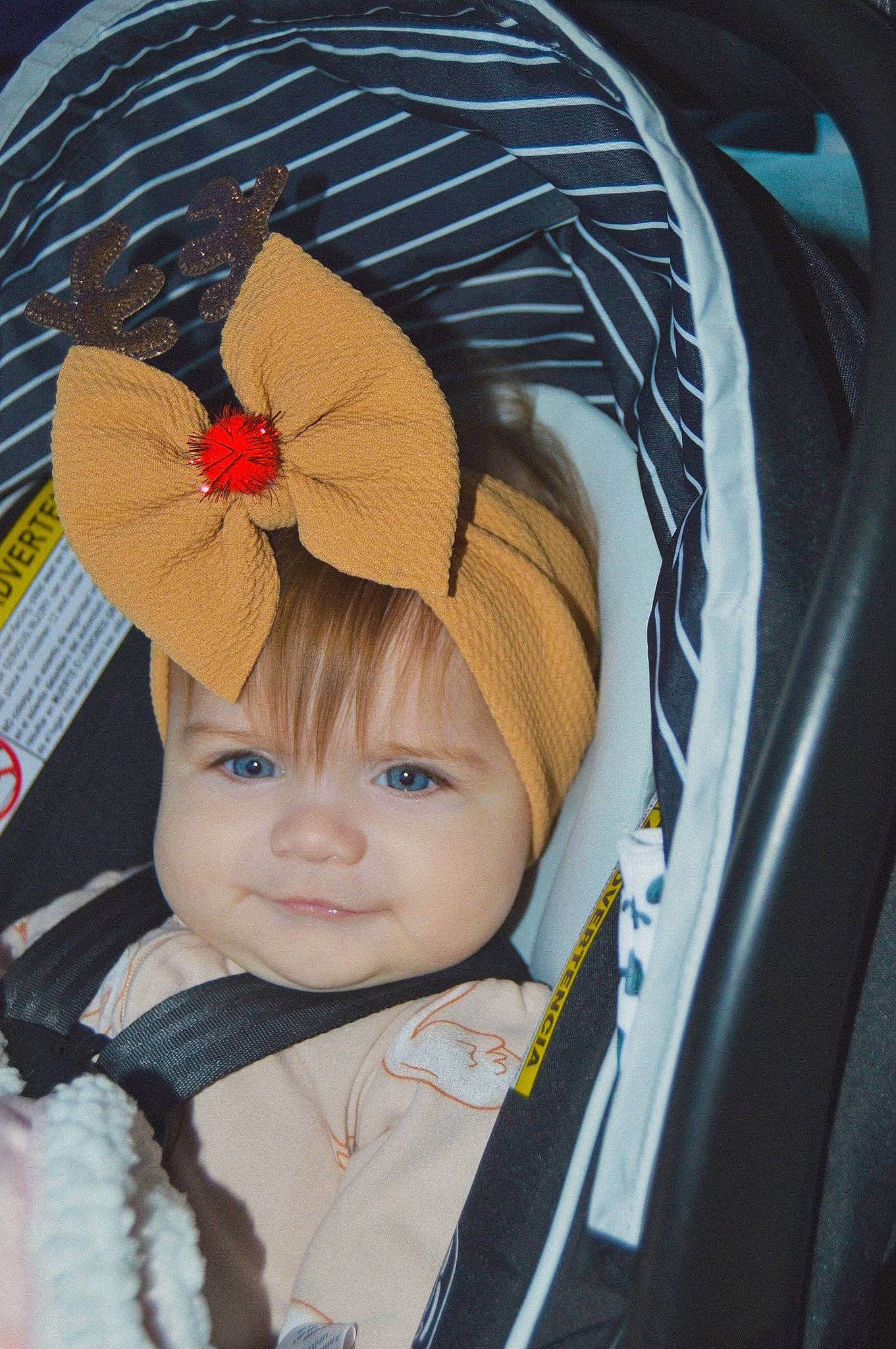 Avaya joined the competition — help win amazing prizes! automotive_design, automotive_exterior, baby, cap, child, costume_hat, electric_blue, eye, fashion_accessory, flower, happy, hat, headgear, headwear, motor_vehicle, person, personal_luxury_car, petal, product, smile