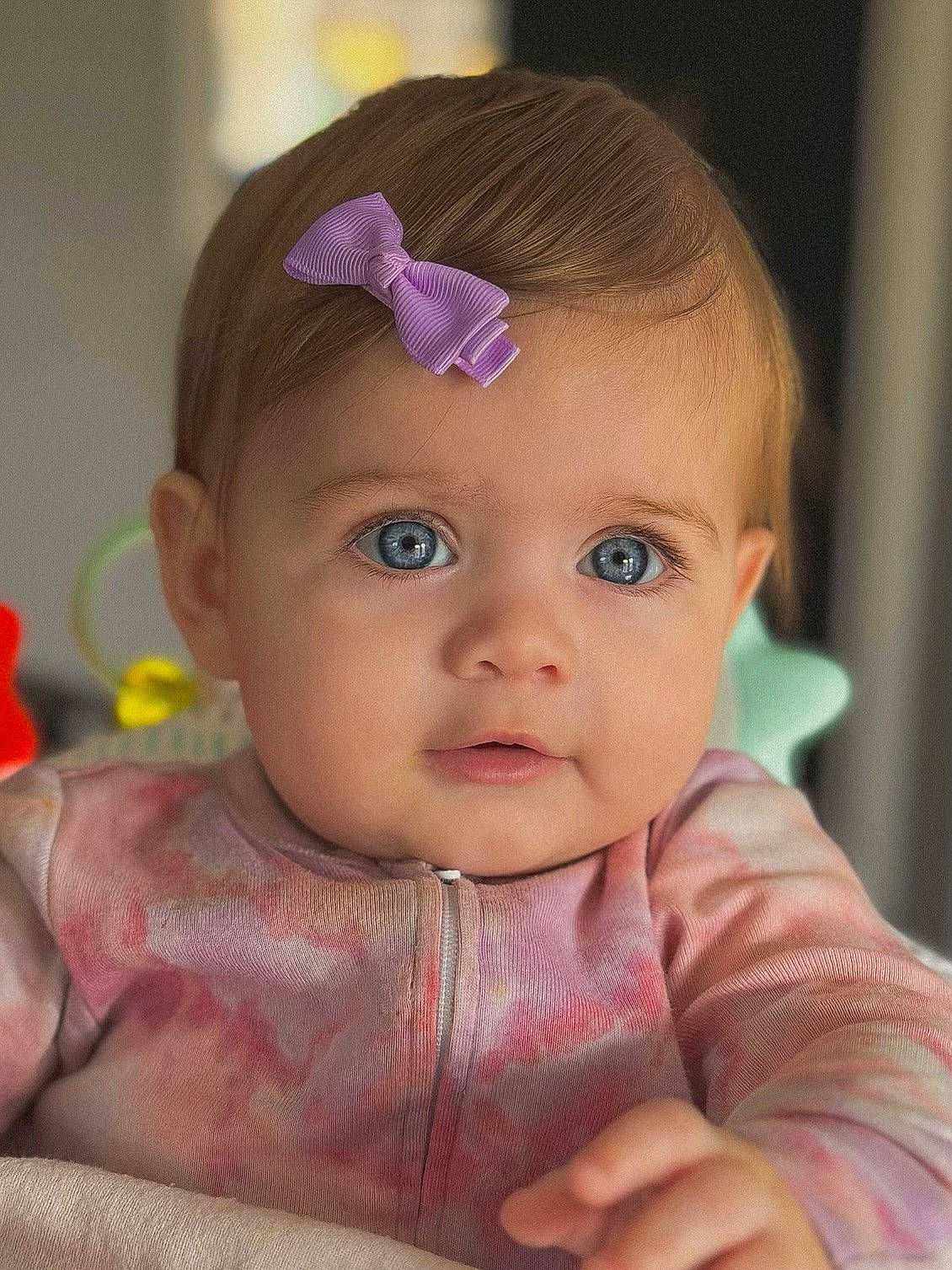 Avaya is registered to the contest to win money with this photo: baby, baby_toddler_clothing, cheek, chin, dress, ear, eyebrow, eyelash, forehead, happy, headband, headpiece, iris, lip, mouth, nose, person, pink, skin, sleeve