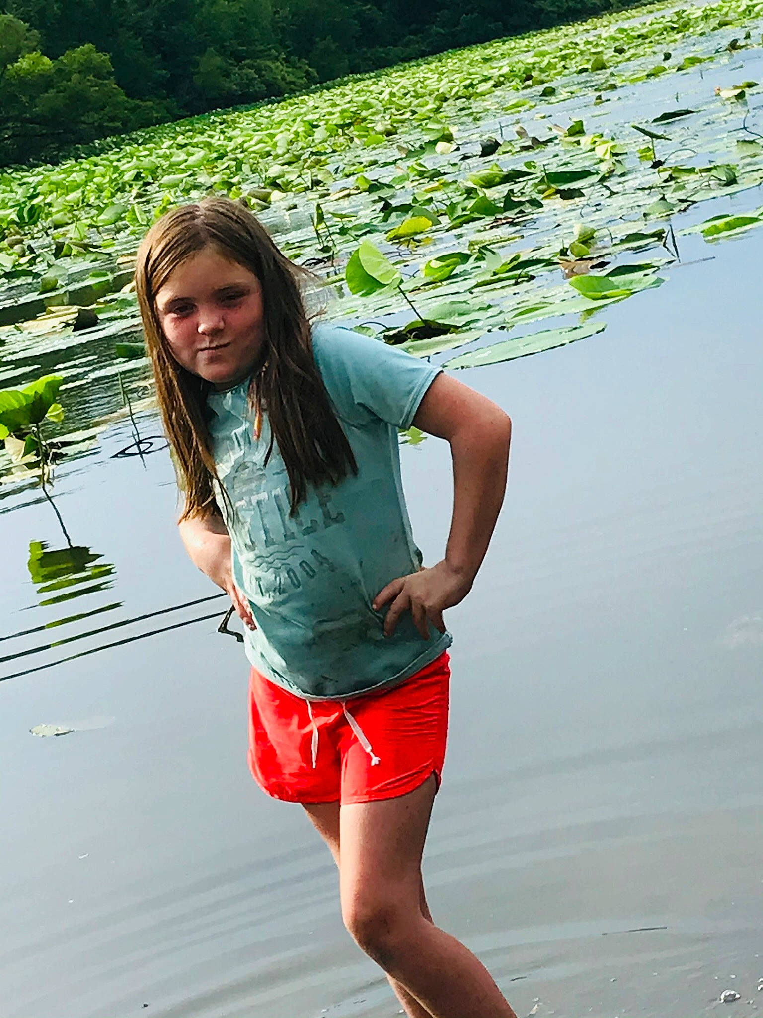 Remington joined the competition — help win amazing prizes! body_of_water, electric_blue, flash_photography, fun, grass, green, happy, human_leg, knee, lake, leisure, long_hair, people_in_nature, person, plant, recreation, shorts, t_shirt, thigh, waist