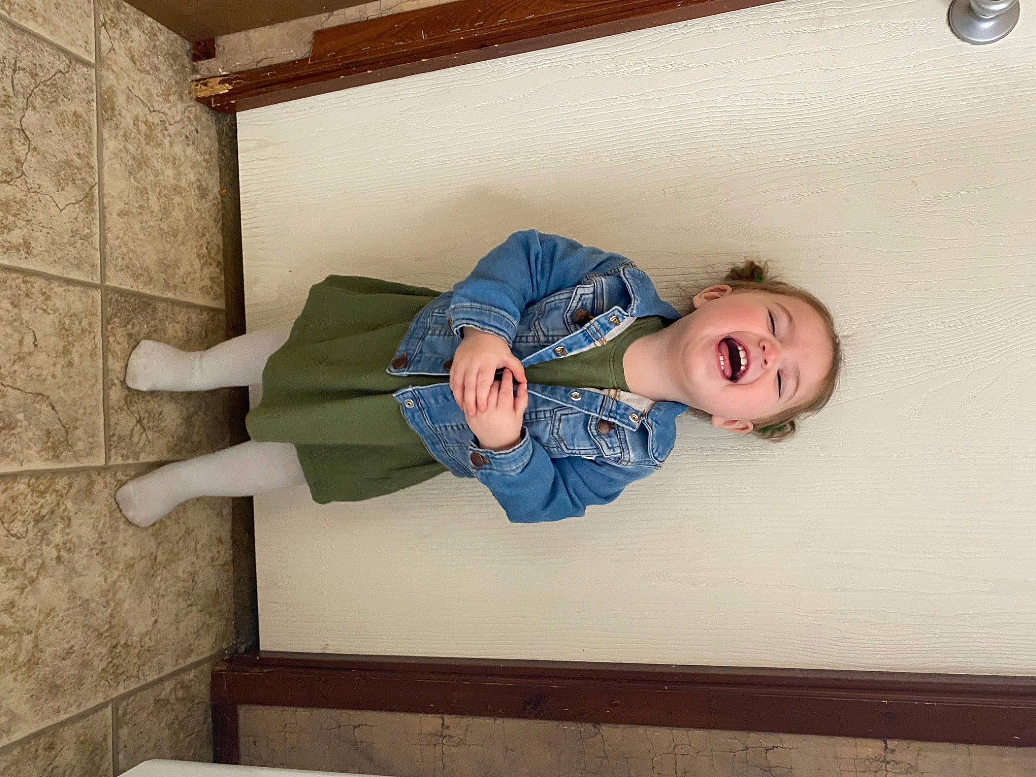 Raelyn joined the competition — help win amazing prizes! baby, baby_products, baby_toddler_clothing, child, comfort, elbow, floor, flooring, fun, hardwood, human_body, knee, leisure, person, room, sitting, sleeve, sock, toddler, wood