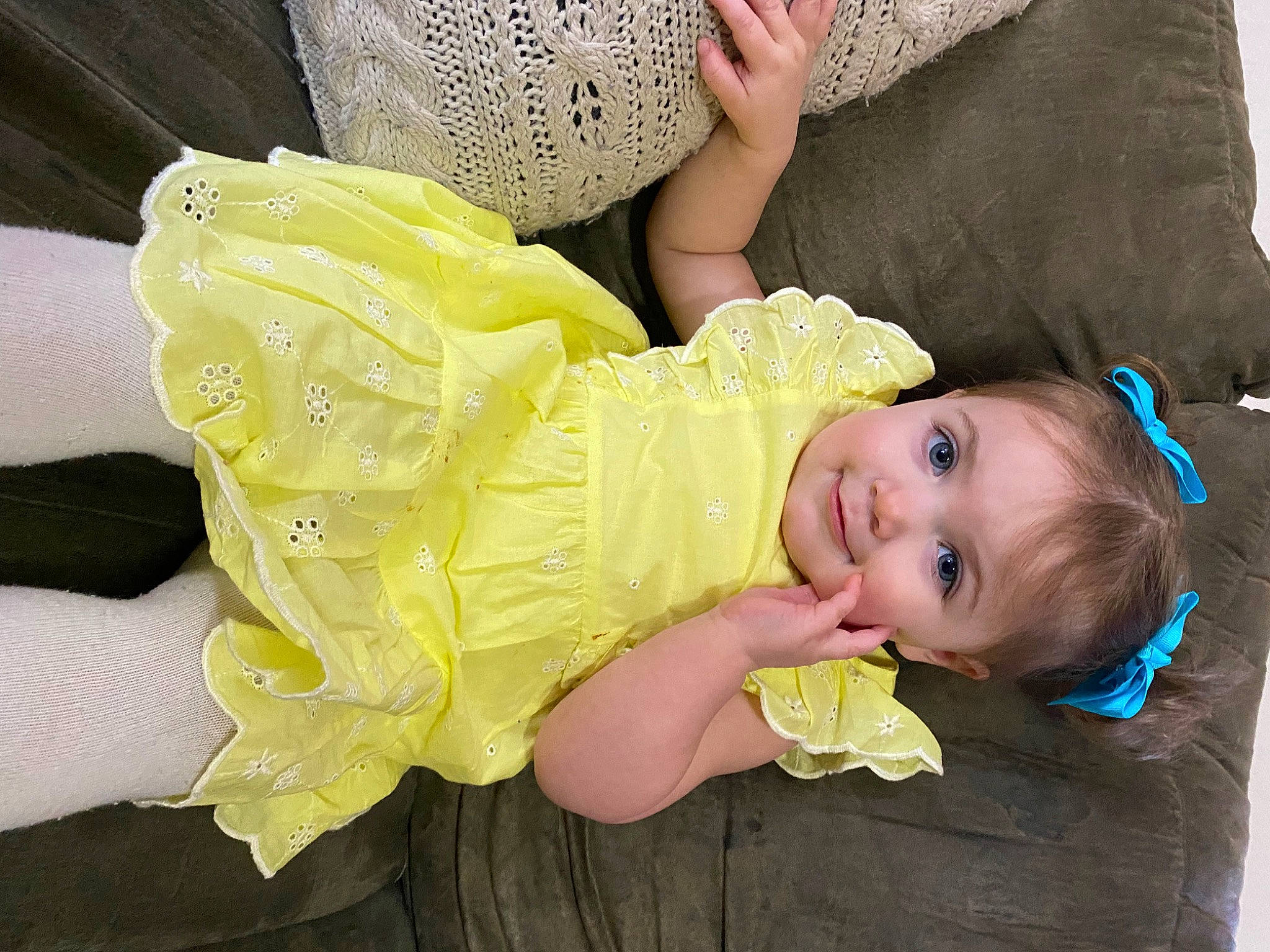 Raelyn is registered to the contest to win money with this photo: abdomen, baby, baby_laughing, baby_products, baby_toddler_clothing, child, comfort, fun, grass, happy, headgear, human_body, joy, person, portrait_photography, sitting, skin, smile, textile, toddler