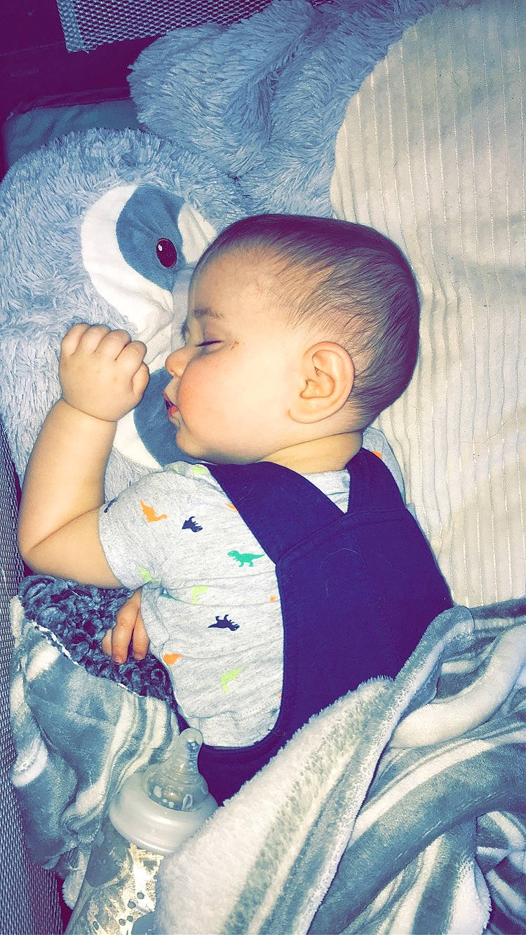 Andrew is registered to the contest to win money with this photo: azure, baby, baby_toddler_clothing, blue, cheek, chin, comfort, cool, eye, finger, hairstyle, happy, iris, lip, mouth, nose, person, product, skin, sleeve