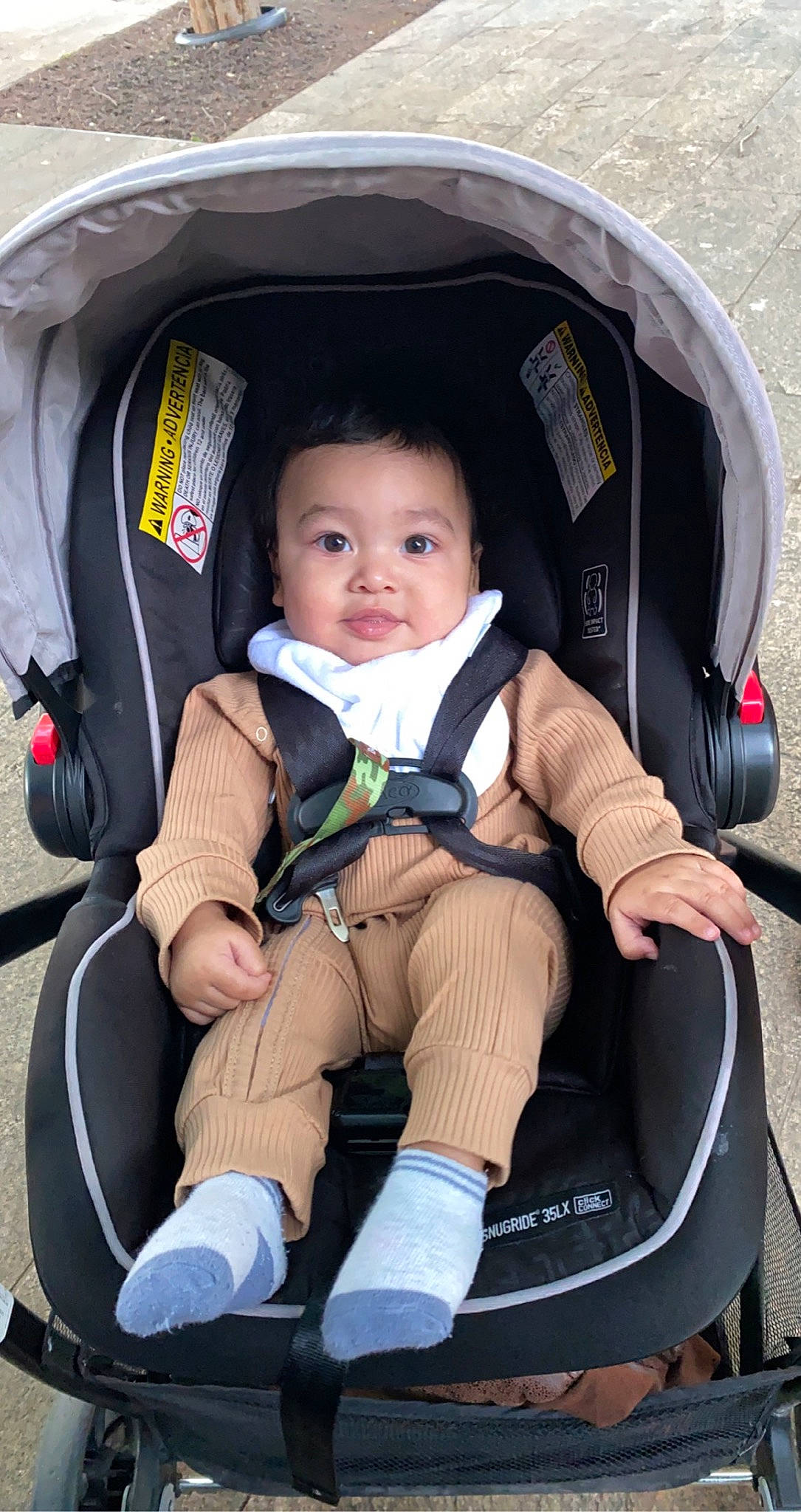 Bryan joined the competition — help win amazing prizes! auto_part, baby, baby_carriage, baby_in_car_seat, baby_products, baby_safety, baby_toddler_clothing, car_seat, child, comfort, facial_expression, fun, lap, mammal, person, sitting, toddler, travel, vacation, wheel