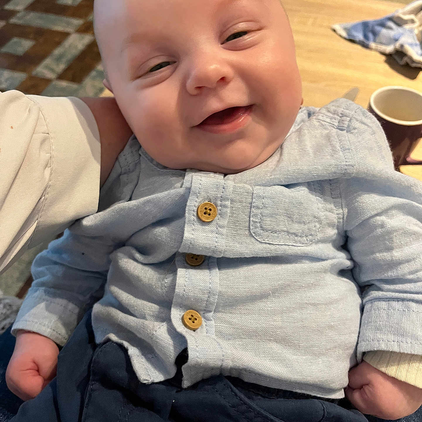 Sacha participe au concours pour gagner de l'argent avec cette photo : baby, blazer, blouse, clothing, coat, cup, dress, face, happy, head, jacket, jeans, laughing, pants, person, photography, portrait, shirt, sitting, smile