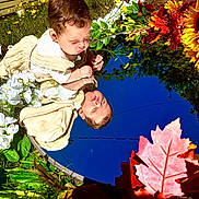 Mako joined the competition — help win amazing prizes! baby, reflection, mirror, flowers, outdoor, garden, nature, infant, curious, sunlight, greenery, colorful, leaf, grass, portrait, child, face, daylight, closeup, peaceful
