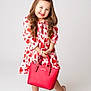 Mirabella joined the competition — help win amazing prizes! child, girl, smiling, dress, hearts, red_handbag, pink_shoes, bow, long_hair, hair_clip, posing, studio, white_background, fashion, cute, portrait, happy, playful, standing, footwear