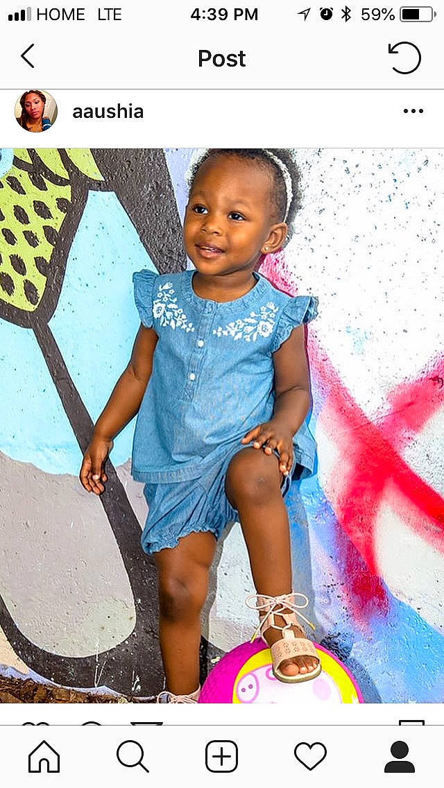 Aya is registered to the contest to win money with this photo: child, design, facial_expression, fun, girl, joy, pattern, person, play, product, smile, t_shirt, toddler