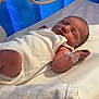 Kaison is registered to the contest to win money with this photo: newborn, baby, infant, sleeping, hospital, bed, white_clothing, wristband, blanket, medical_equipment, peaceful, child, indoors, portrait, resting, skin, head, face, human, person