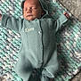 Kaison joined the competition — help win amazing prizes! baby, newborn, sleeping, knitted_clothing, onesie, hood, blanket, braided_blanket, soft_texture, infant, peaceful, cute, cozy, lying_down, indoor, portrait, child, toddler, baby_garment, resting