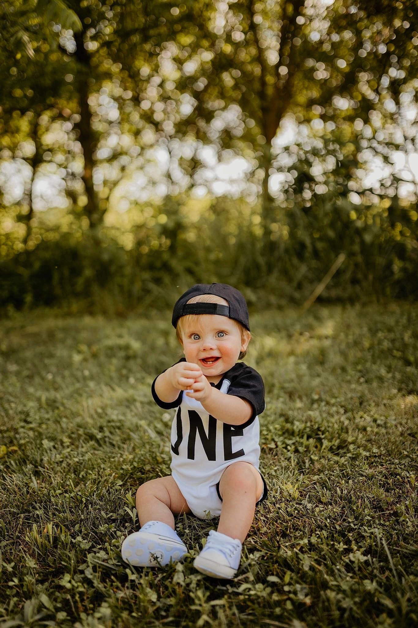 Clayton joined the competition — help win amazing prizes! child, face, flash_photography, football, fun, grass, grassland, happy, hat, headwear, joy, landscape, leg, leisure, people_in_nature, person, plant, recreation, shorts, sneakers
