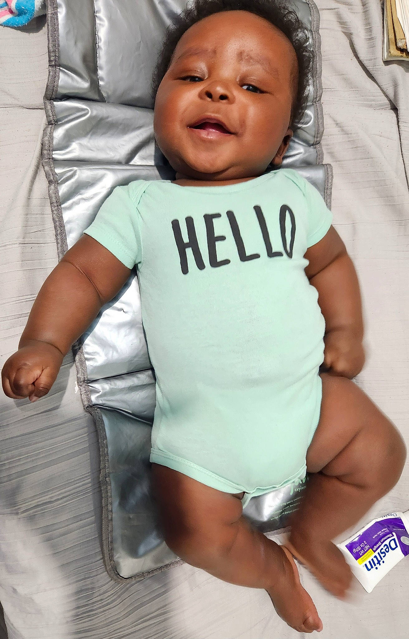 Elijah is registered to the contest to win money with this photo: baby, baby_toddler_clothing, cheek, comfort, cool, eye, face, finger, gesture, happy, head, human_body, person, skin, sleeve, smile, t_shirt, thigh, thumb, toddler