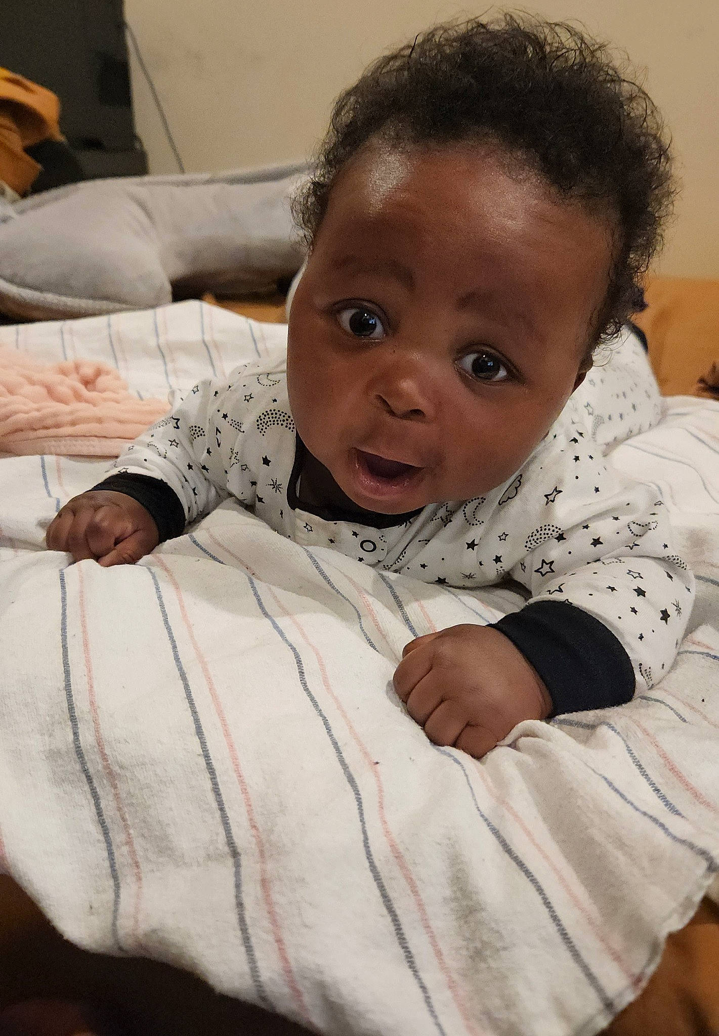 Elijah joined the competition — help win amazing prizes! baby, baby_toddler_clothing, cheek, child, comfort, couch, eye, eyebrow, gesture, hair, happy, head, iris, linens, lip, mouth, nose, person, skin, sleeve