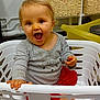 baby, barefoot, child, cute, expression, furniture, grey_shirt, hands, happy, home, indoor, laundry_basket, person, plastic, playful, red_pants, sitting, smiling, toddler, woven_baskets