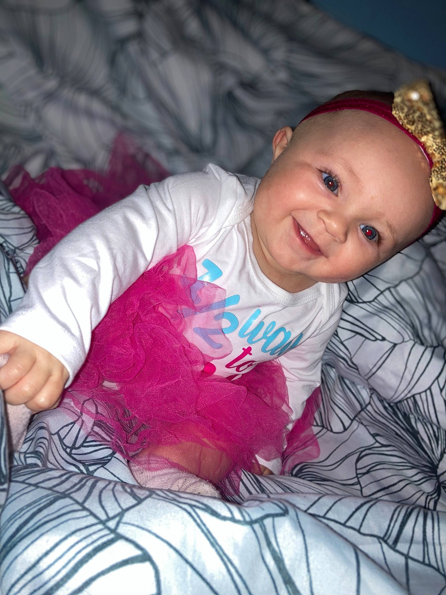 Jazlynn joined the competition — help win amazing prizes! baby, baby_toddler_clothing, cheek, comfort, eye, face, finger, flash_photography, happy, human_body, iris, joy, lip, mouth, nose, person, pink, purple, skin, sleeve