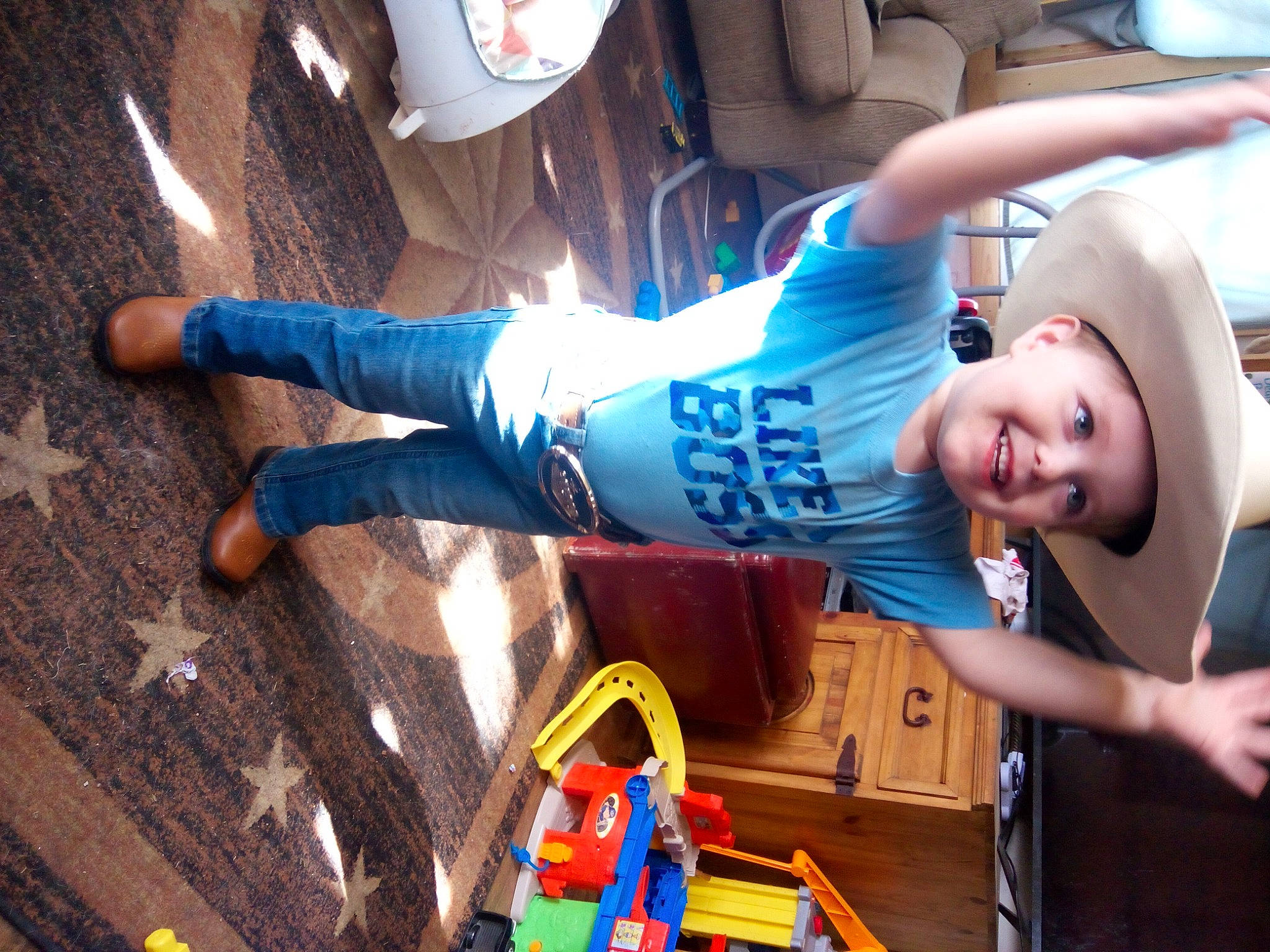 Avery is registered to the contest to win money with this photo: baby, baby_products, child, electric_blue, event, fun, happy, hat, headwear, human_leg, joy, leisure, person, photograph, play, recreation, snapshot, sneakers, t_shirt, thigh