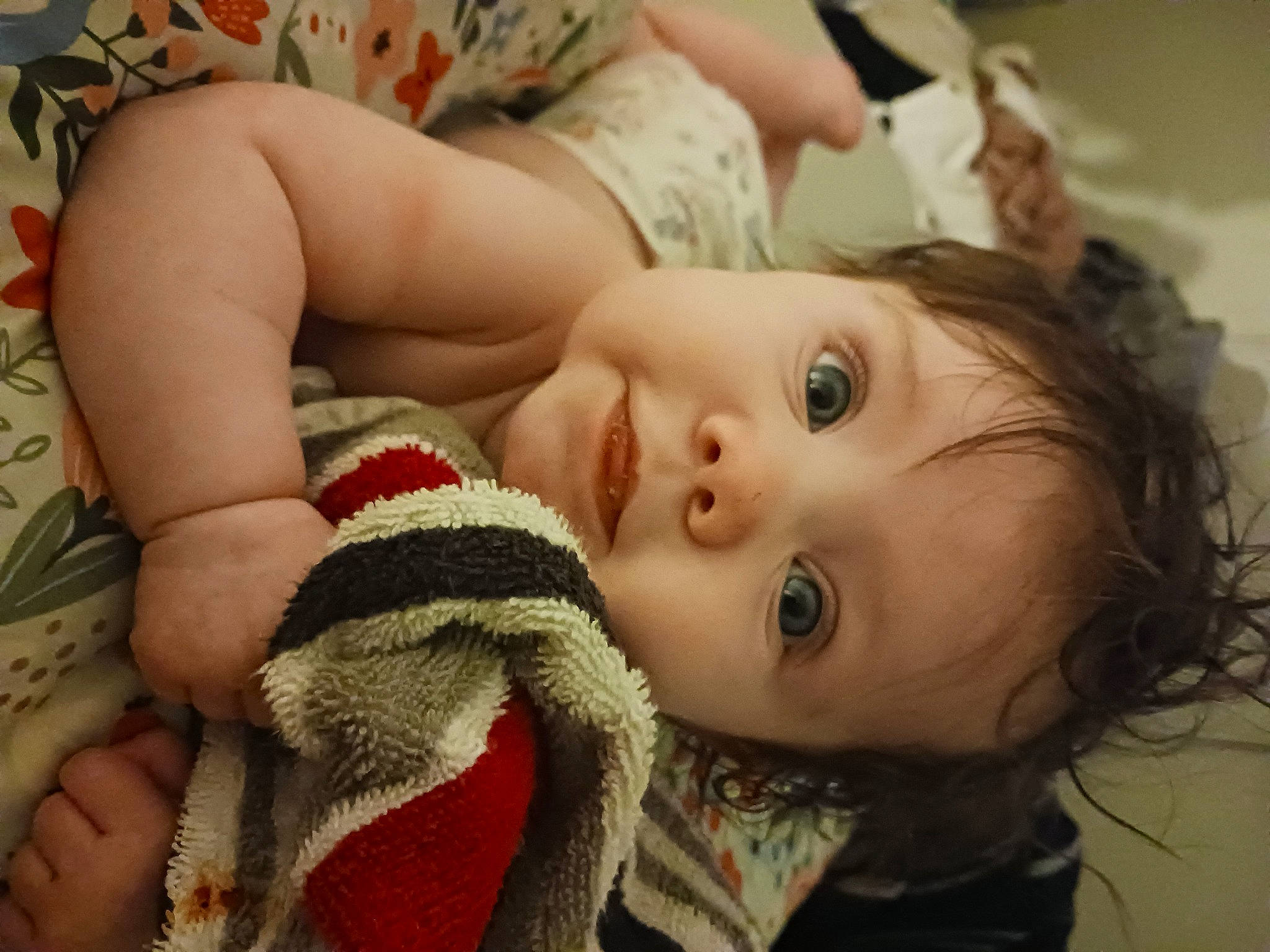 Ellie is registered to the contest to win money with this photo: baby, blond, cheek, chest, child, close_up, comfort, eyebrow, eyelash, happy, human_body, iris, lip, mouth, nose, person, skin, textile, thigh, toddler