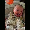 baby, car_seat, child, cute, fabric, face, happy, head, indoors, infant, onesie, orange, person, playful, seat, smile, soft_toy, straps, toy, winnie_the_pooh