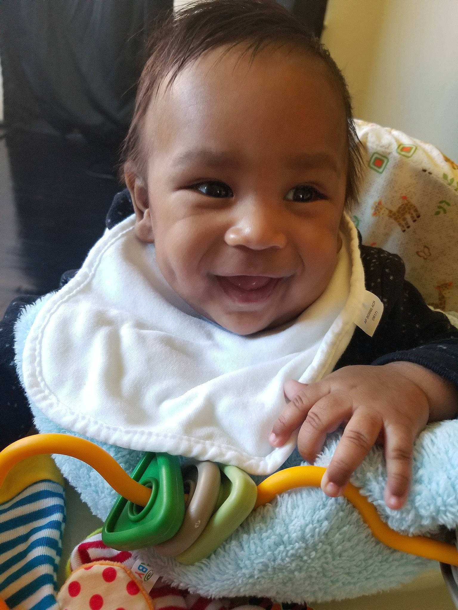 Ronald joined the competition — help win amazing prizes! baby, cheek, child, eating, head, linens, nose, person, play, skin, smile, textile, toddler