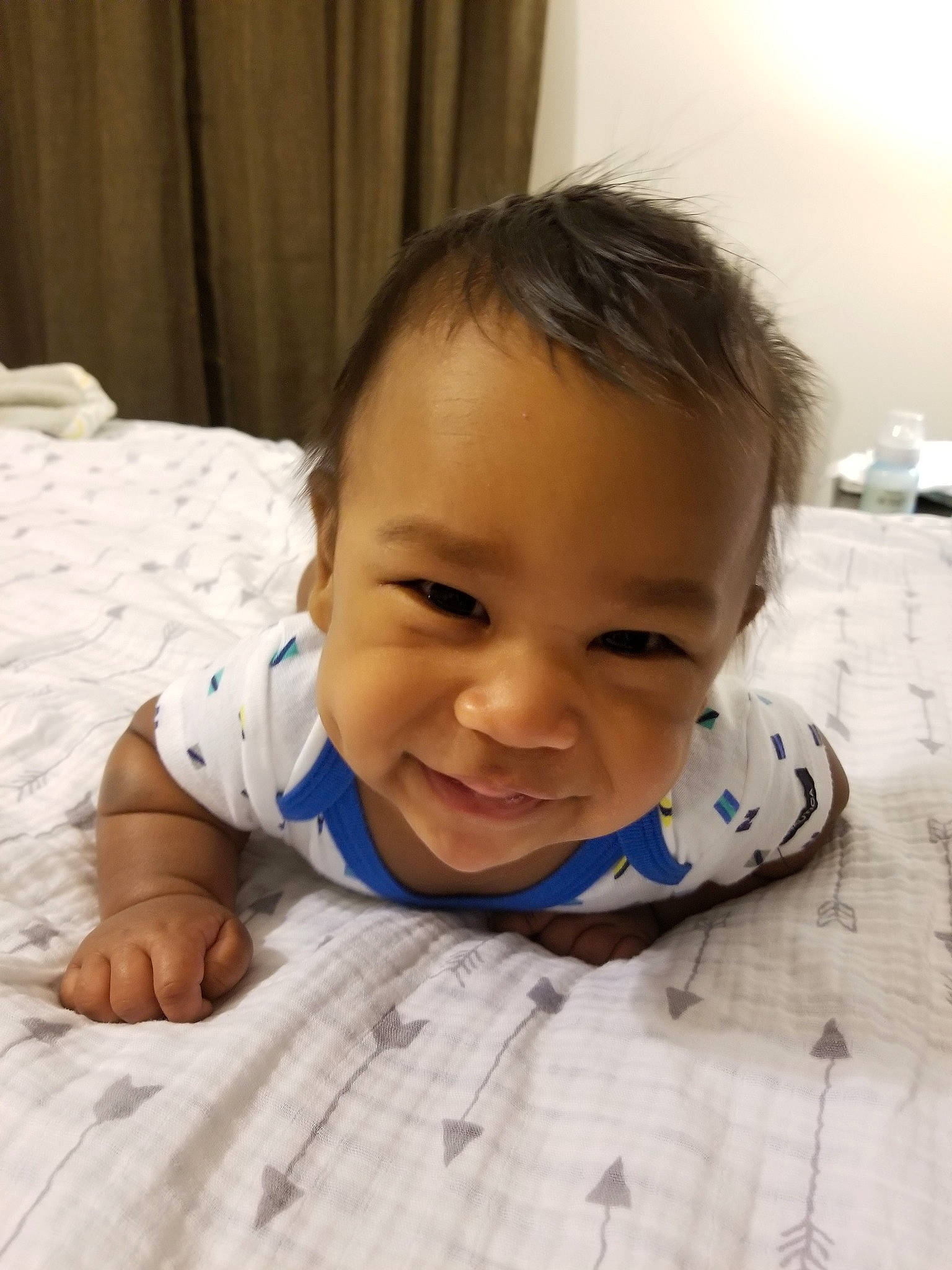 Ronald is registered to the contest to win money with this photo: baby, cheek, child, chin, crawling, eye, face, facial_expression, finger, floor, forehead, happy, head, lip, mouth, nose, person, skin, smile, toddler